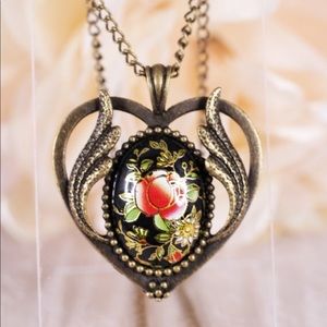 Bronze heart necklace with flower cameo